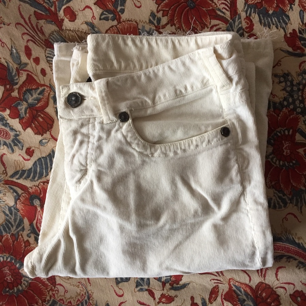 Frayed hem cream fine-waled corduroy pants